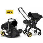 Doona Infant Car Seat & Stroller - Nitro Black - Infant - Rear-Facing 4-35 lbs - Integrated Wheels - Adjustable Handlebar